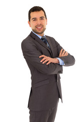 man crossing arms standing in a suit