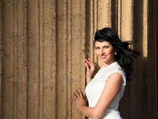 Fototapeta premium Beautiful brunette in wedding dress