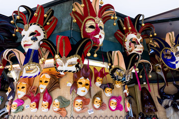Various venetian masks on sale .  colorful artistic masks on the