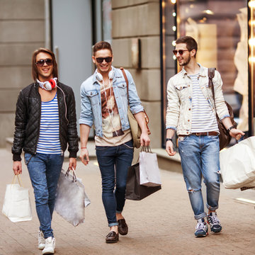Three Young male fashion shop shopping walk