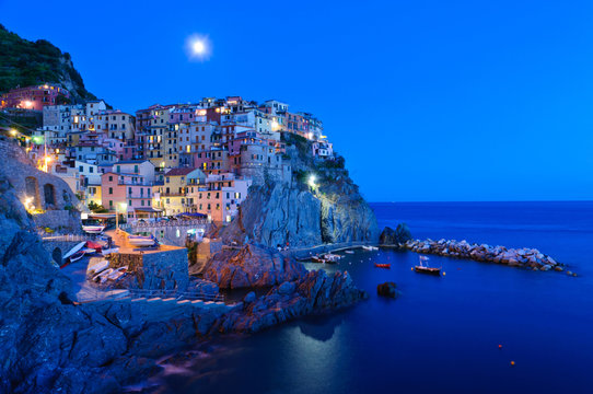 Village of Manarola at dusk in Cinqueterre, Italy