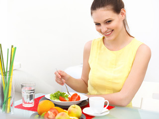 Close-up Of Beautiful Woman Eating healthy food