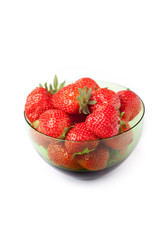 Bowl of fresh strawberries on white background