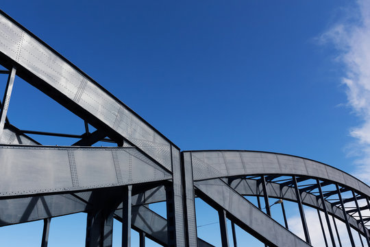 Construction of a railway bridge against sky  sunlight