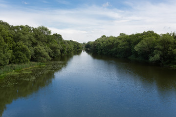 Fototapeta na wymiar View from the bridge through Nara's river in Serpukhov