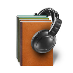 headphones with books isolated on white