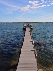 Fototapeta premium Holzsteg am Meer