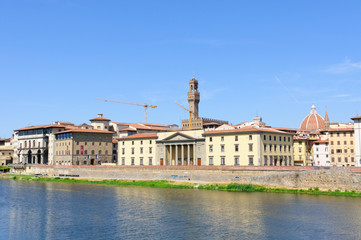 Fototapeta na wymiar Old City and the Arno river - Historic centre of Florence in Ita