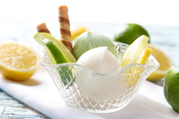 Ice cream scoops on wooden table