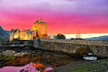 Vibrant sunset over the famous Eilean Donan Castle, Scotland