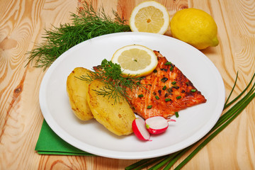 Grilled salmon fillet with boiled potatoes.  