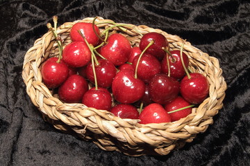 Sweet fresh cherries in basket