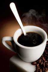 cup of coffee on dark background