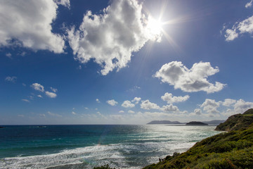 gerakas beach with clouds and sun