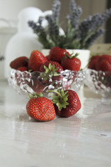 still life with strawberries and flowers