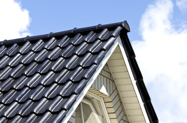 roof on a new house with blue sky