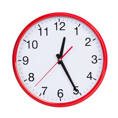 Fototapeta na wymiar Round clock shows half of the first