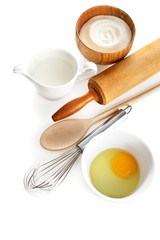 Obraz na płótnie Canvas Ingredients and kitchen tools on white background.