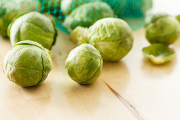 Brussels sprouts cabbage on old wooden table