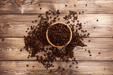 Roasted coffee beans in a bowl