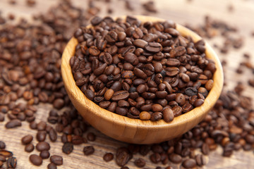Roasted coffee beans in a bowl