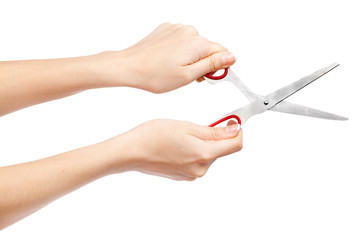 Female hand holding scissors