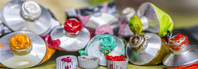 Tubes of acrylic color crushed and consumed