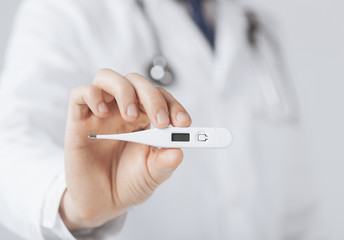 male doctor with thermometer