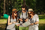 Three Tourists Sightseeing Nature