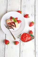 Tasty homemade strudel with ice-cream, fresh strawberry and