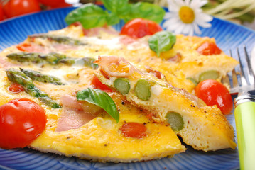 frittata with green asparagus,ham and cherry tomato