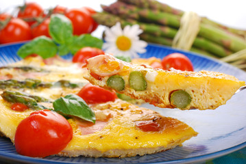 frittata with green asparagus,ham and cherry tomato