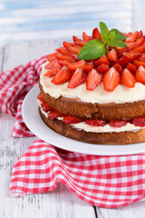 Delicious biscuit cake with strawberries