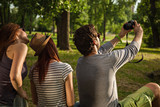 Three Tourists Taking Selfie