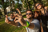 Three Young People Taking Selfie