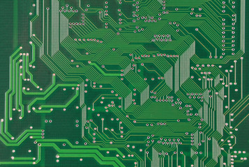 Close up of a printed green computer circuit board