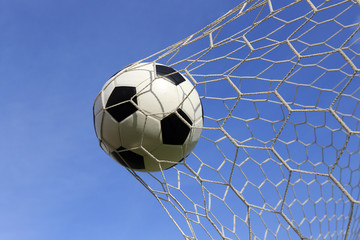 Socce in the goal net