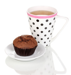 Fresh muffin with tea isolated on white