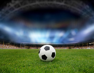 Soccer ball on the field of stadium