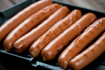Close-up of grilled sausages, horizontal shot