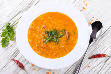 Soup of bulgur and lentils with smoked lamb ribs