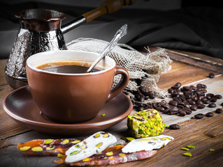 Turk and coffee Turkish delight on a wooden board