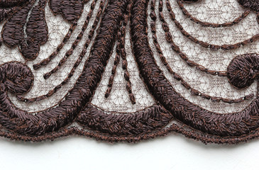Brown leaves lace material texture macro shot