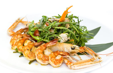 shrimp salad greens vegetables and crayfish in the restaurant