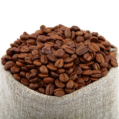 Coffee beans in a canvas bag.