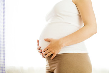 Pregnant woman at home