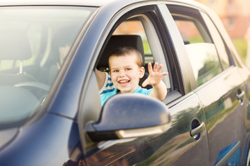 Father and son driving car