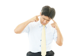 頭痛を訴えるビジネスマン