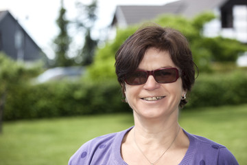 Woman portrait in green nature