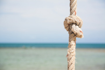 knot on the rope and sea